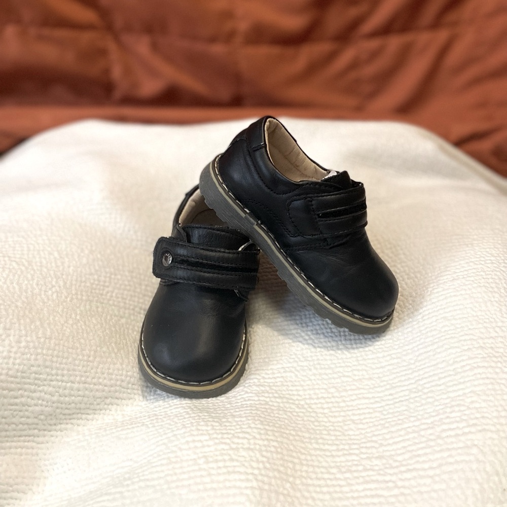 Boy size 24 black dress shoe.